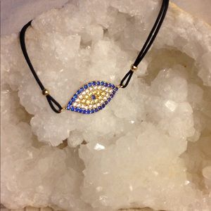 REAL SILVER EVIL EYE CORD BRACELET